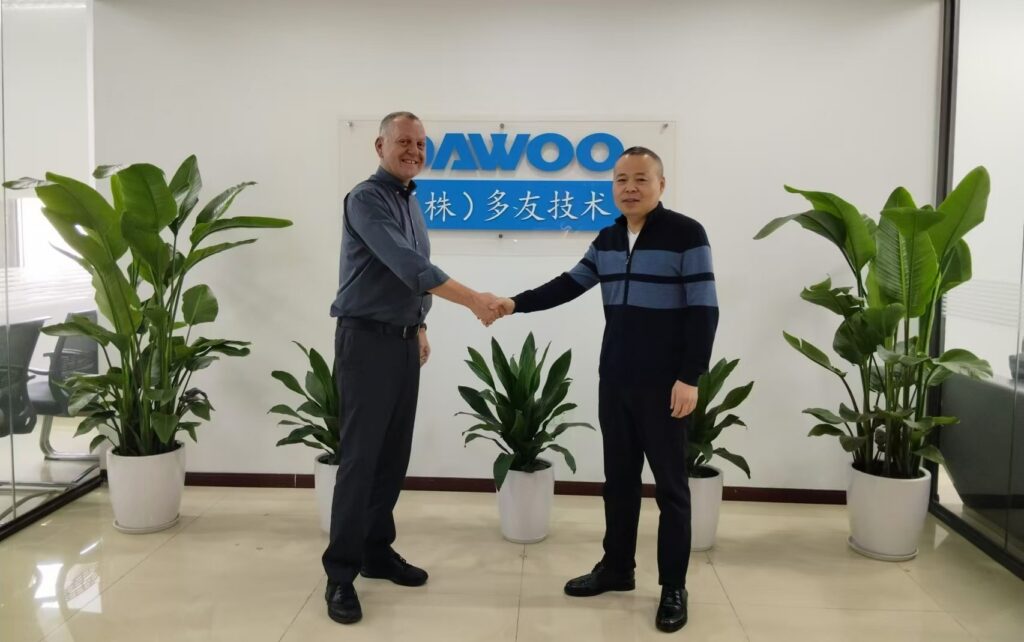 Mr. Gert Groenkjaer, Sales Manager China at Green Instruments, and Mr. Shen Guoliang, General Manager of DAWOO Tech Co., Ltd.