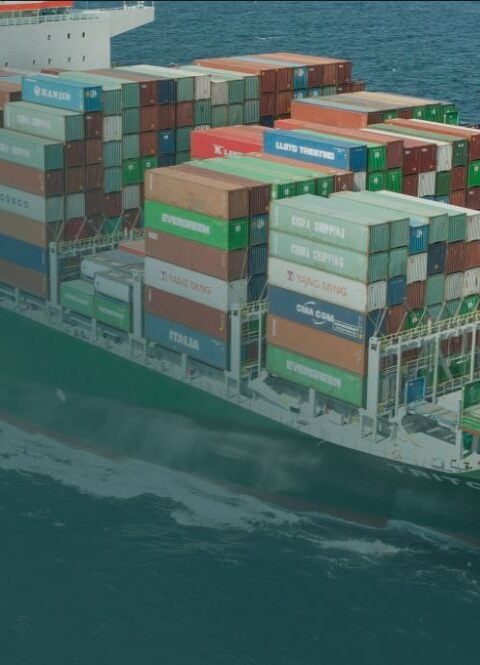 Commercial vessel in green ocean