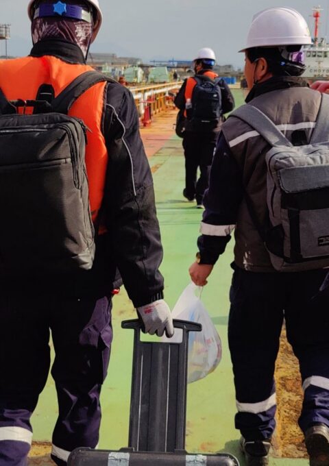 Service engineers onboard a vessel